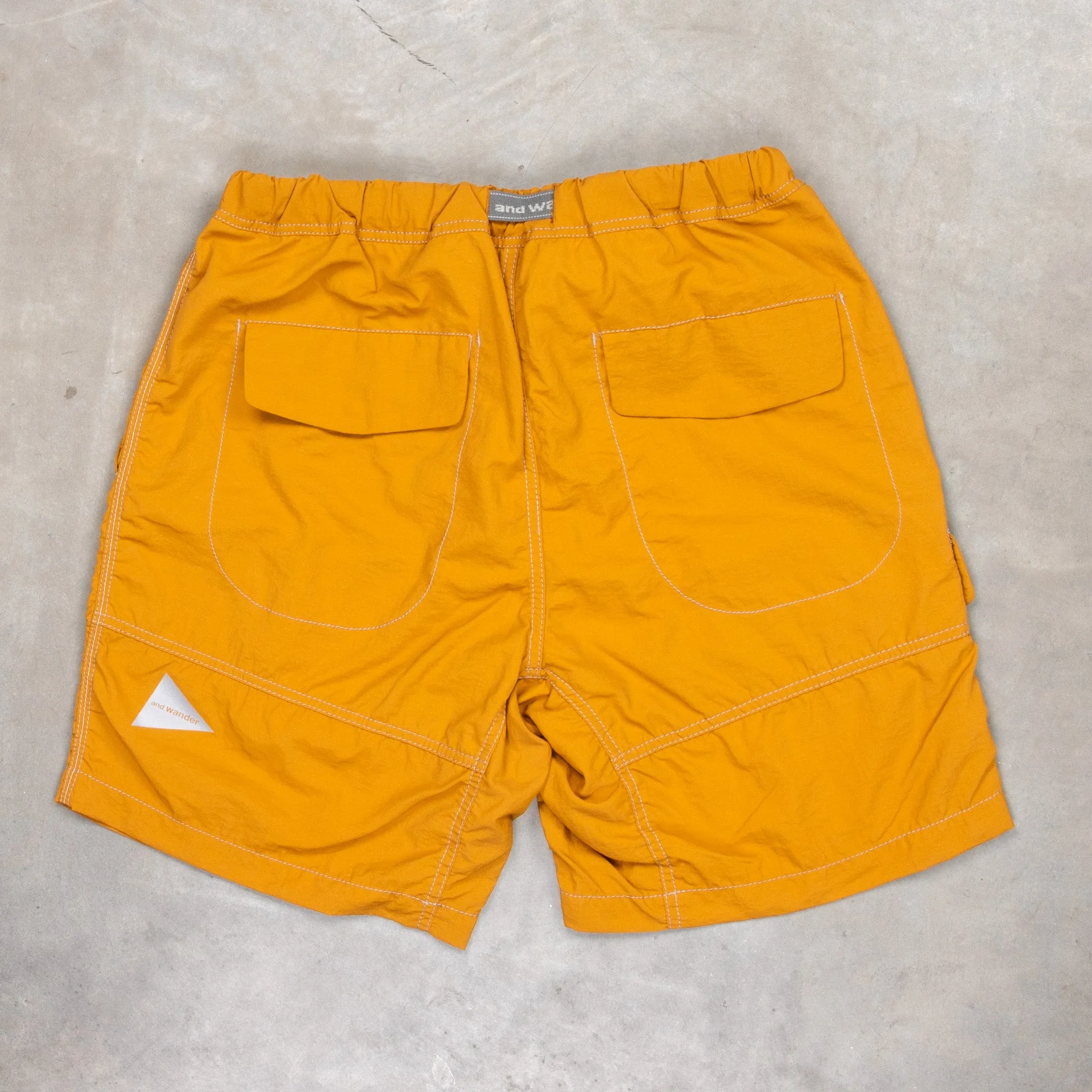 And Wander Ny Taffeta Hiker Shorts Yellow